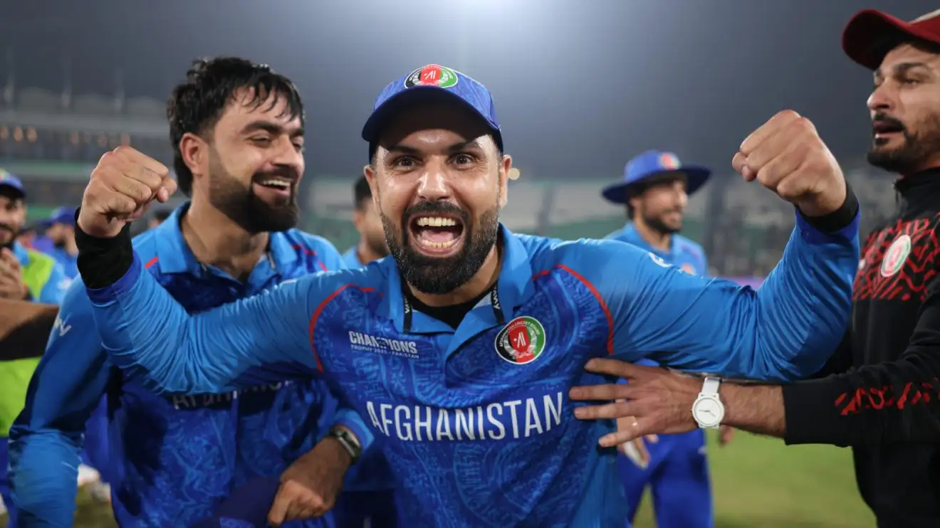 Mohammad Nabi celebrates