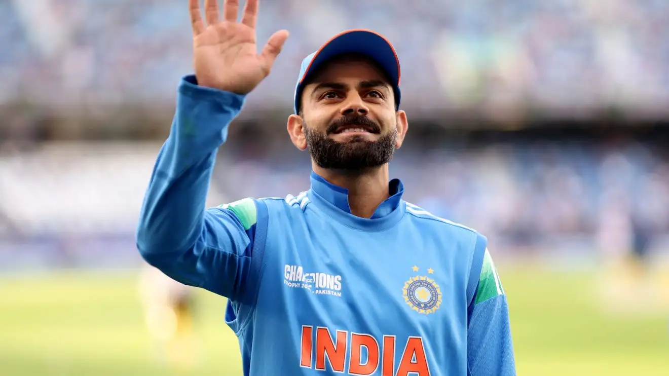 Virat Kohli waves
