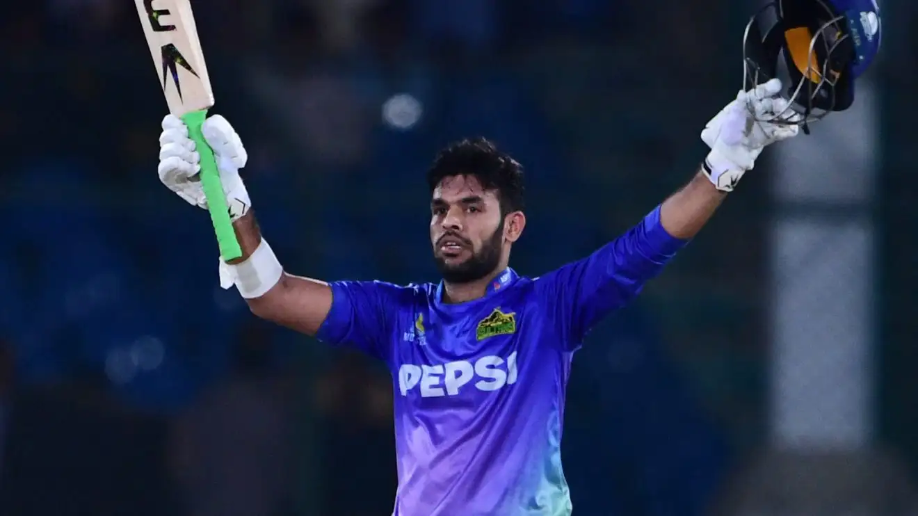Usman Khan celebrates