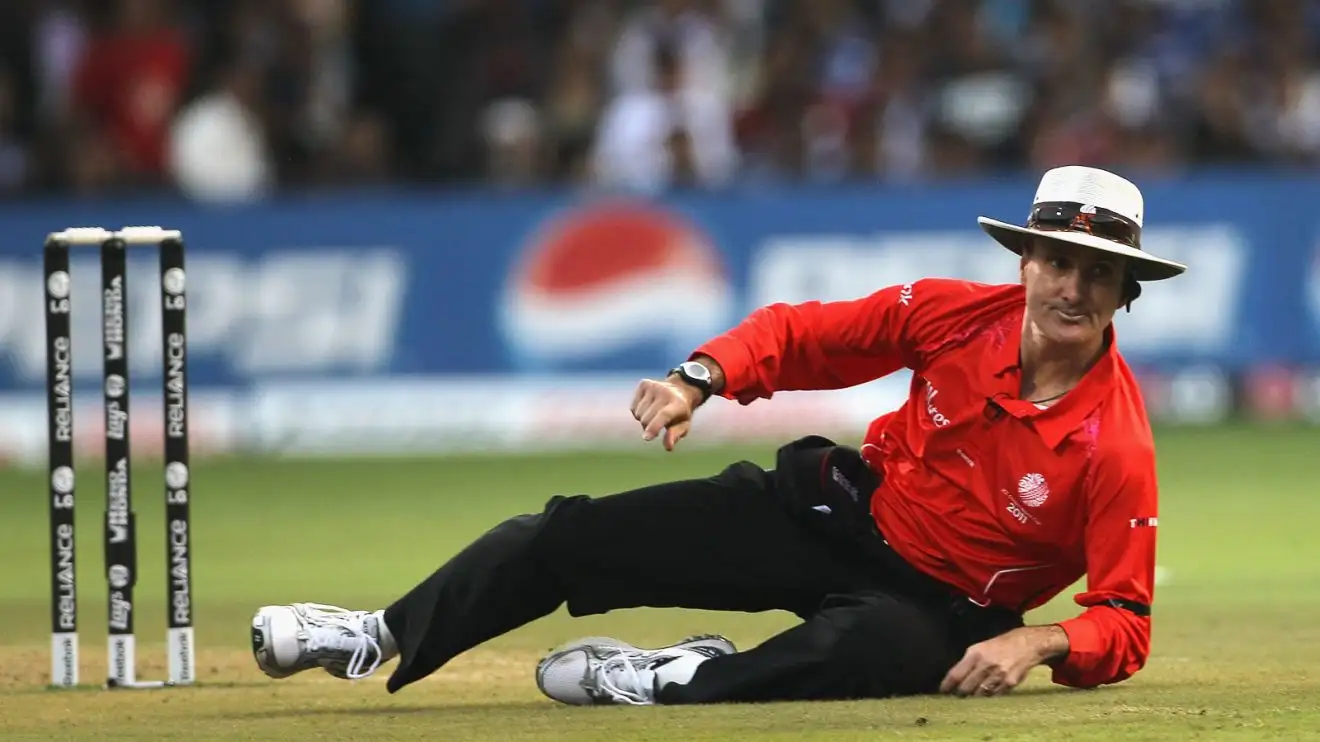 Billy Bowden slides
