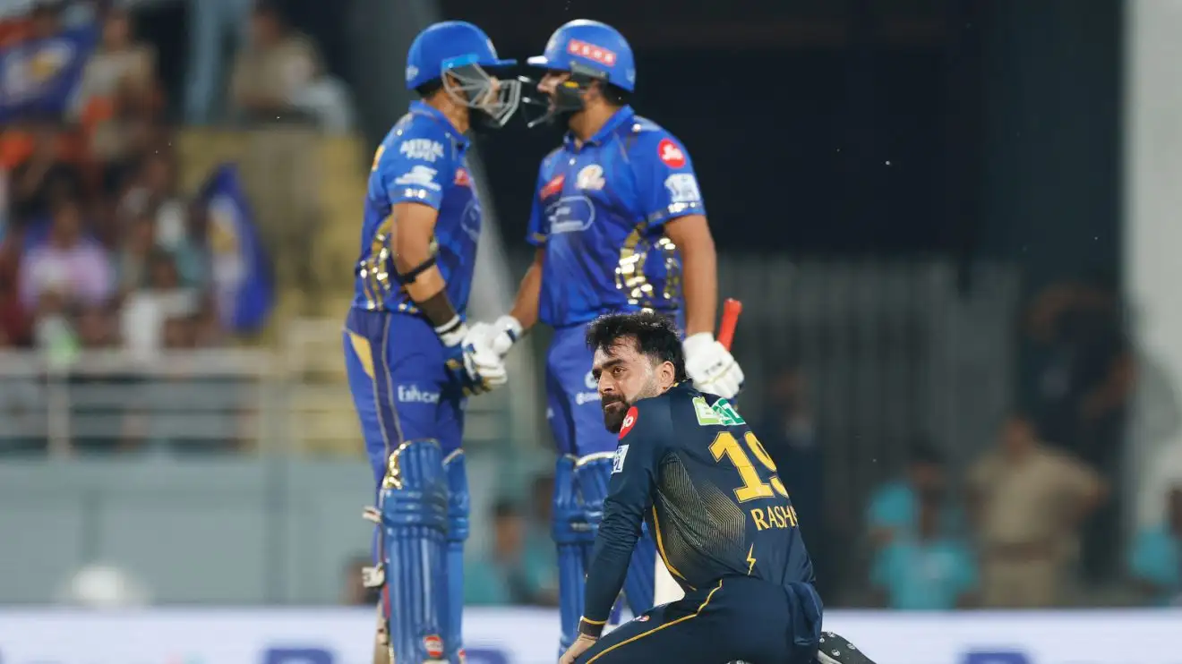 Rashd Khan on his knees