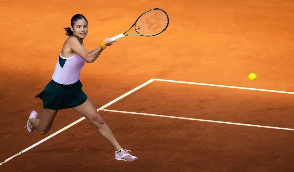 Emma Raducanu plays a shot