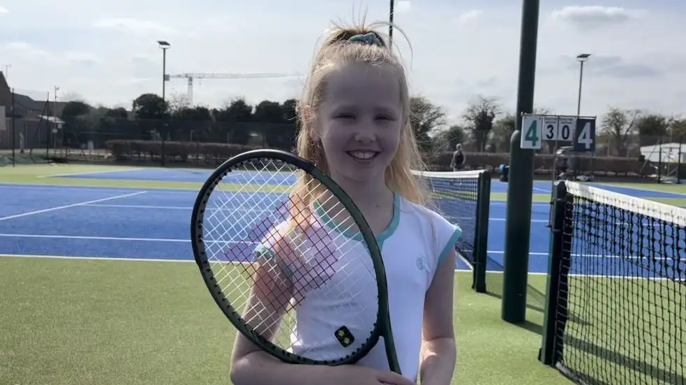 Ana with a Wilson Junior Blade racket