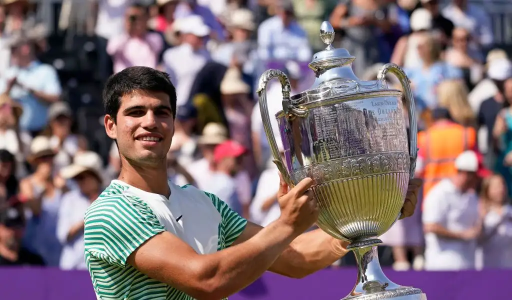 Carlos Alcaraz celebrates winning the Queen's Club Championships
