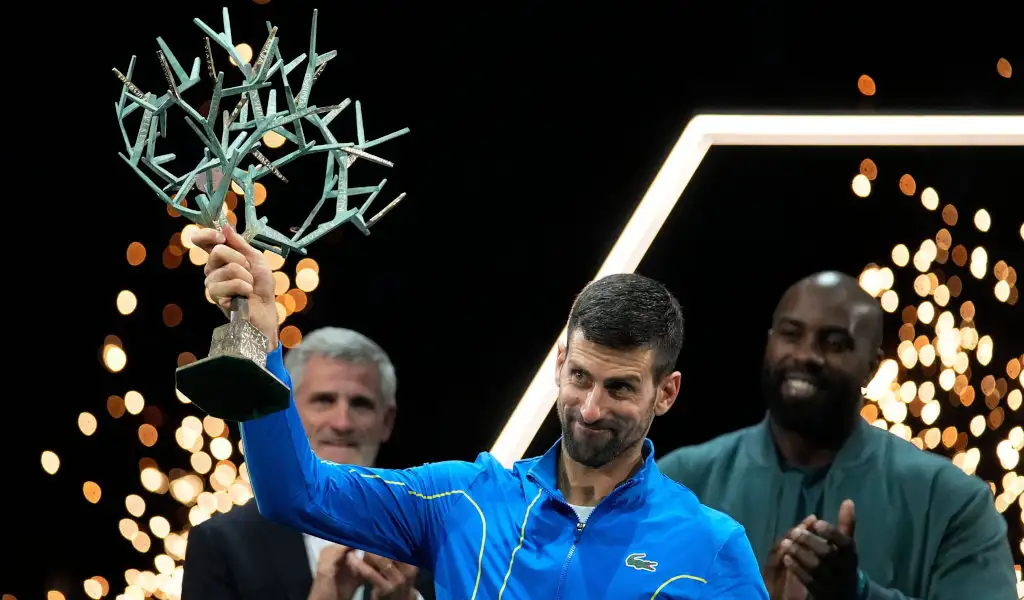 Novak Djokovic celebrates winning the 2023 Paris Masters