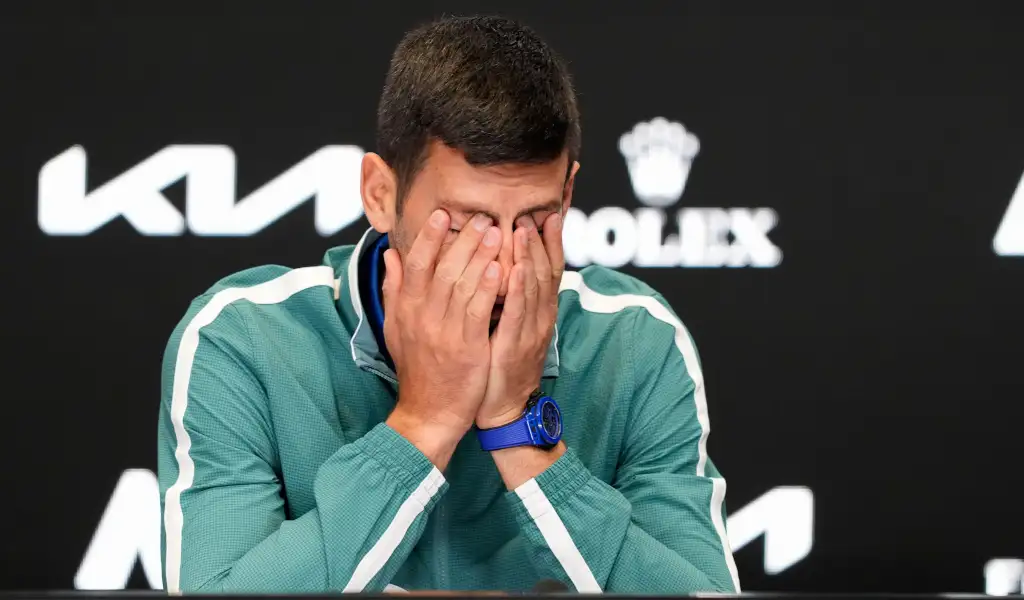 Novak Djokovic speaks to the media