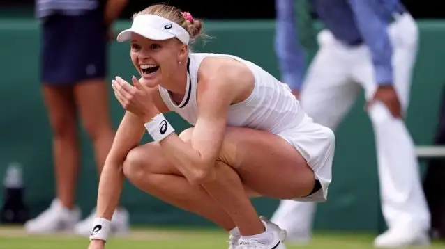 Harriet Dart celebrates after beating Katie Boulter at Wimbledon.