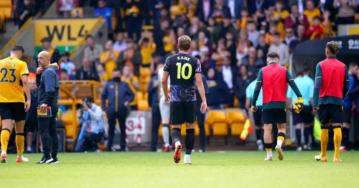 Harry Kane walks off the field after Spurs beat Wolves