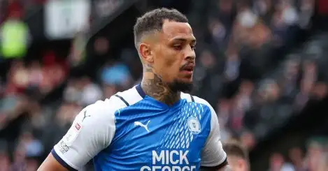 Peterborough striker receives four-game ban for historic posts