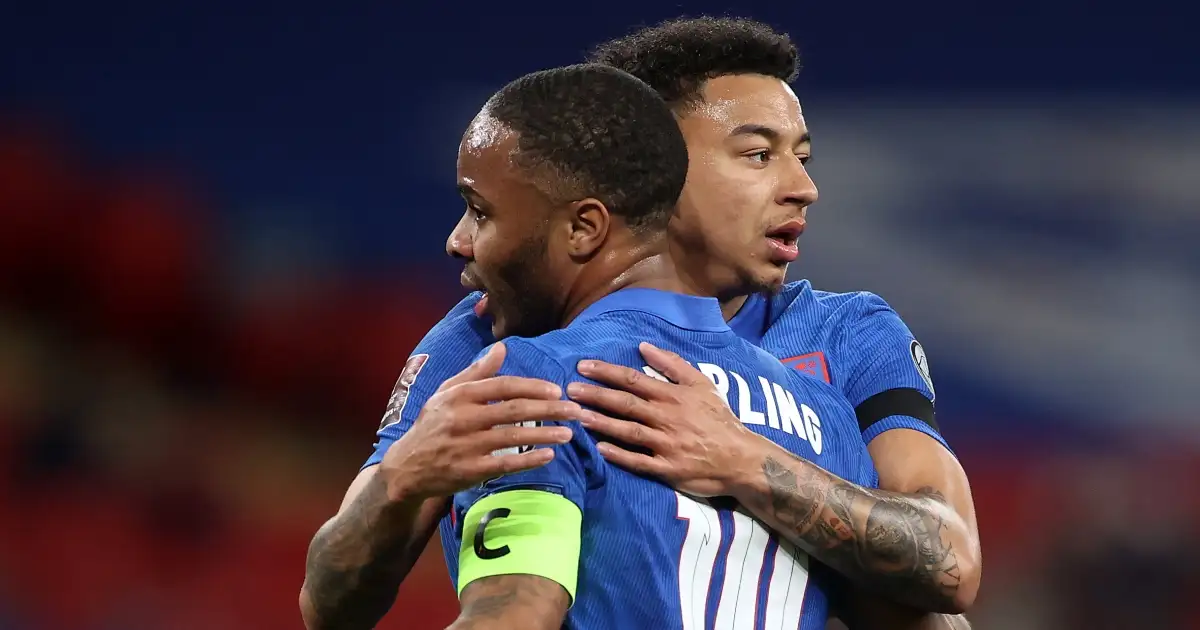 Sterling and Lingard embrace for England