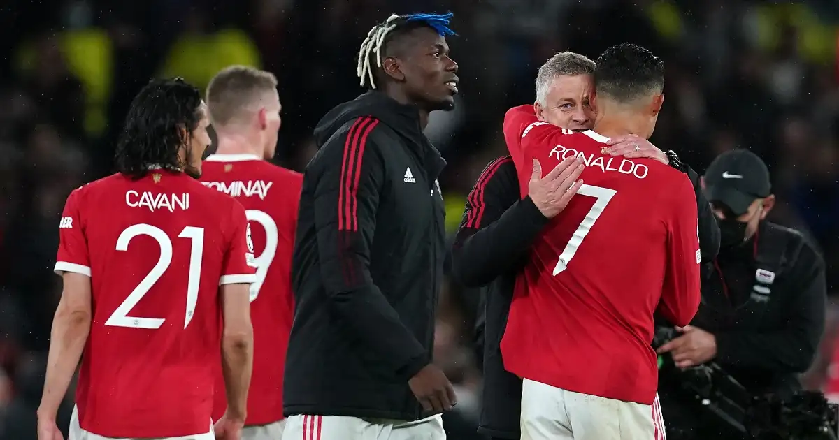 Manchester United manager Ole Gunnar Solskjaer hugs Cristiano Ronaldo