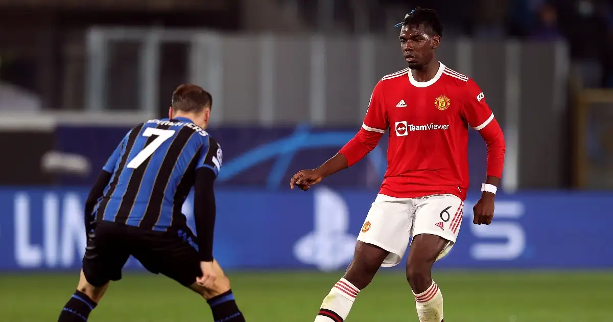Manchester United midfielder Paul Pogba stands up an opposition player