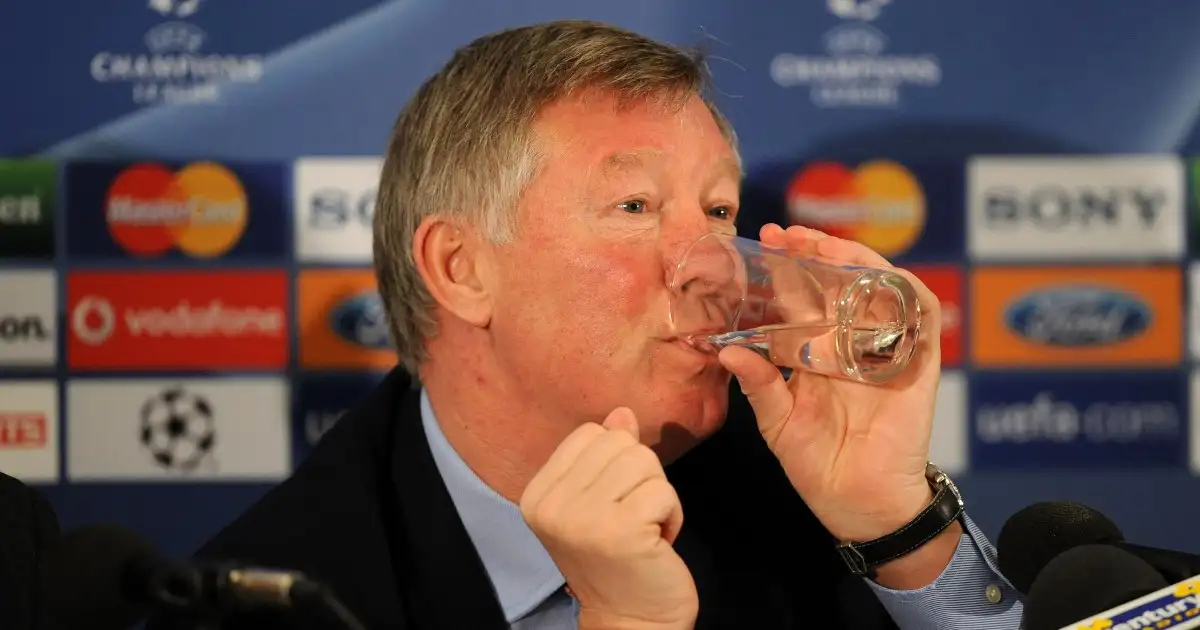 Sir Alex Ferguson takes a drink
