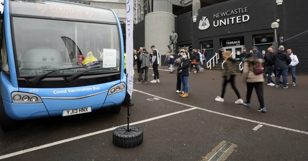 A Covid vaccination bus is parked at Newcastle United.