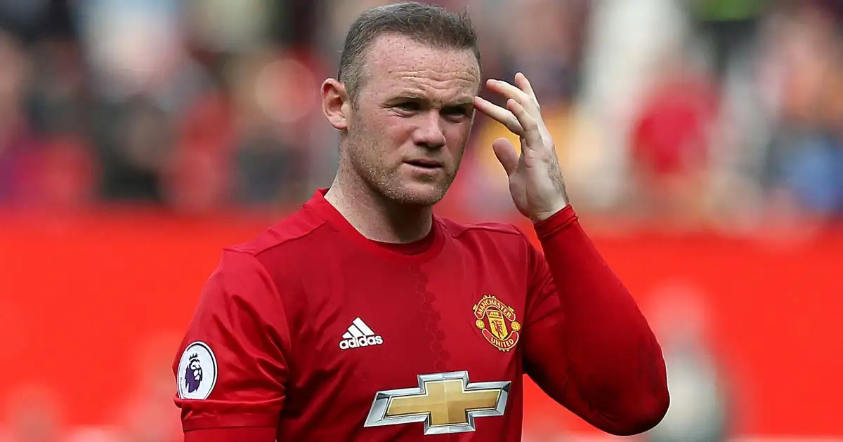 Man Utd striker Wayne Rooney scratches his head