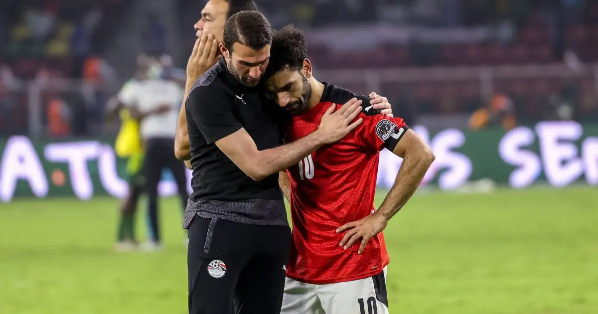 Liverpool forward Mo Salah is consoled