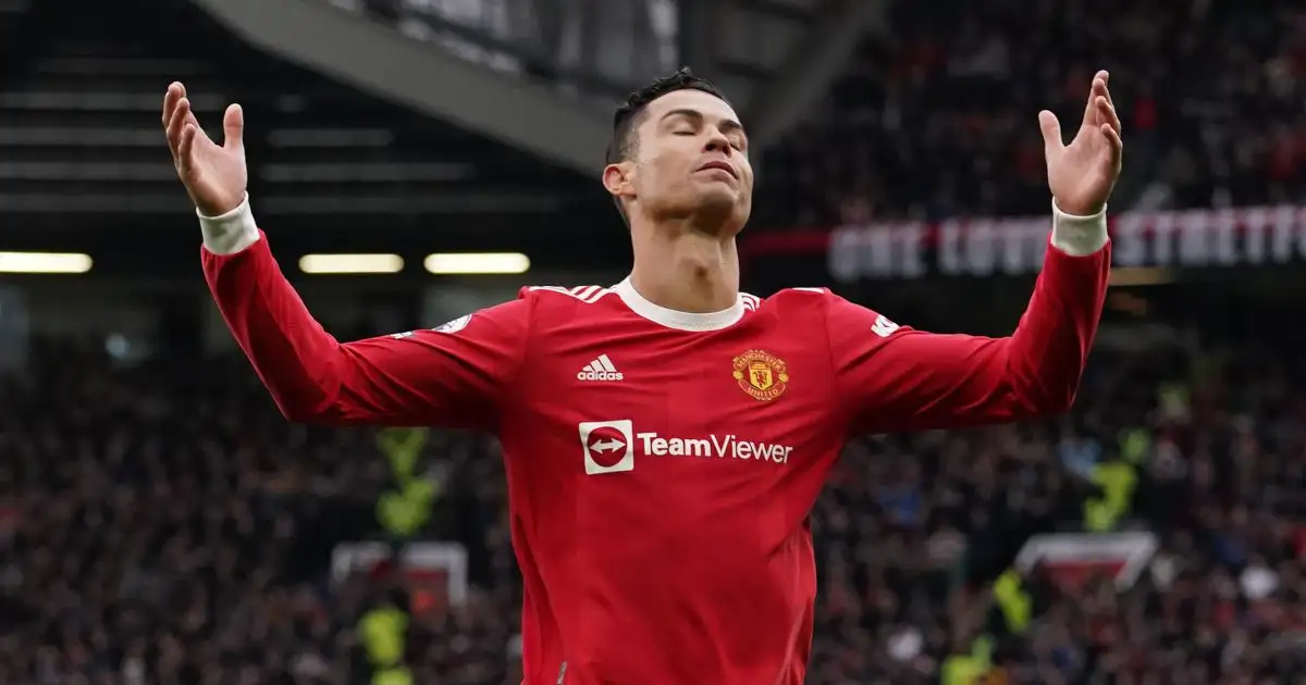 Man Utd striker Cristiano Ronaldo throws his hands in the air