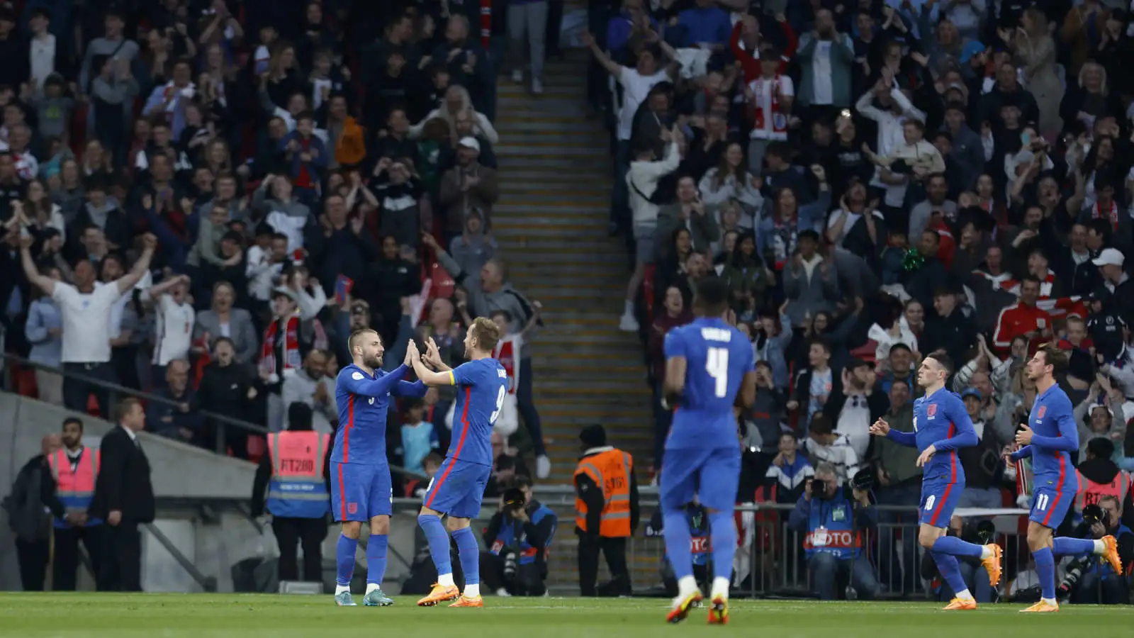 England players celebrate Luke Shaw's goal against Switzerland