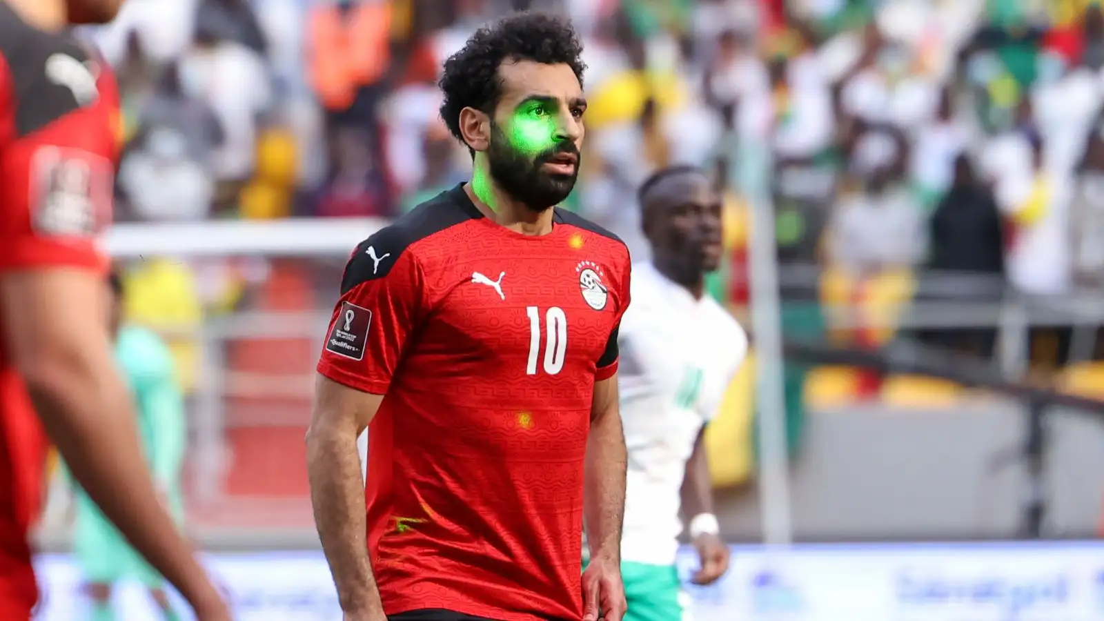 Mo Salah has a laser pen shone in his face
