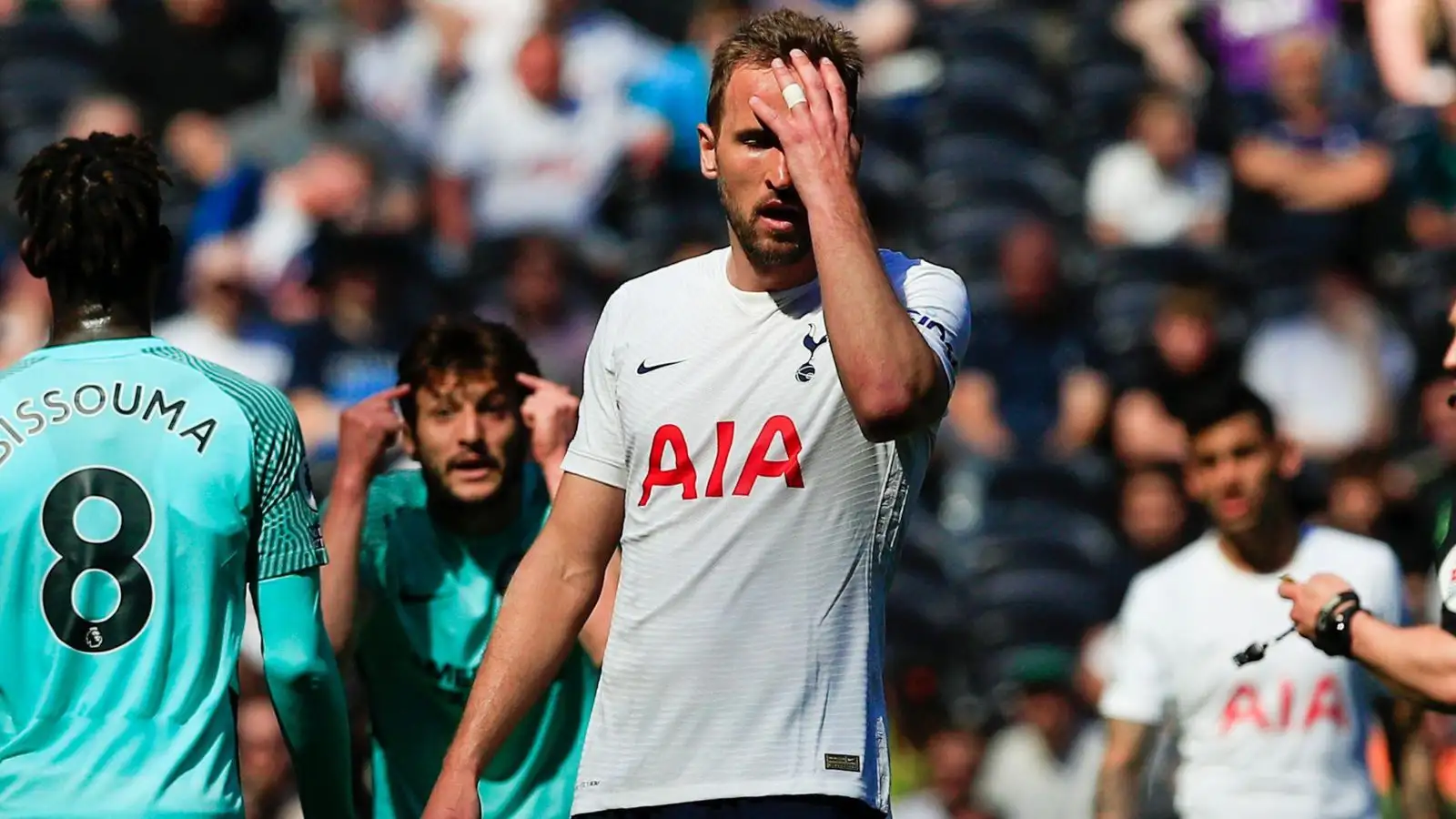 Harry Kane reacts during Tottenham's defeat to Brighton.