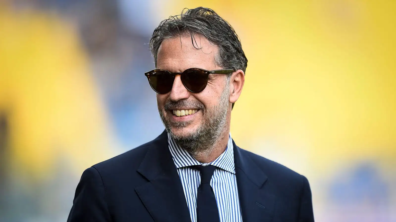Tottenham director of football Fabio Paratici smiles