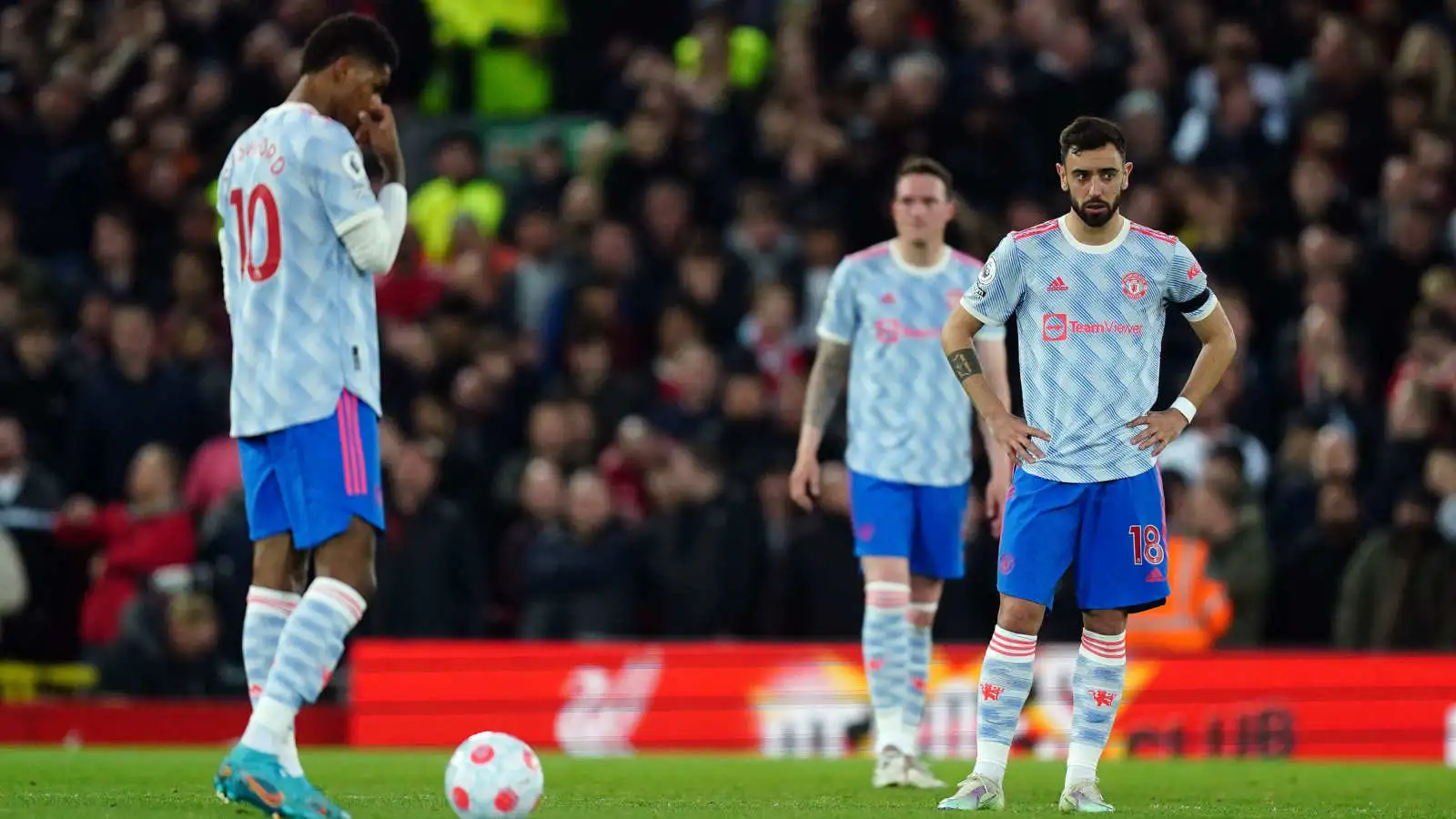 Manchester United players after conceding to Liverpool