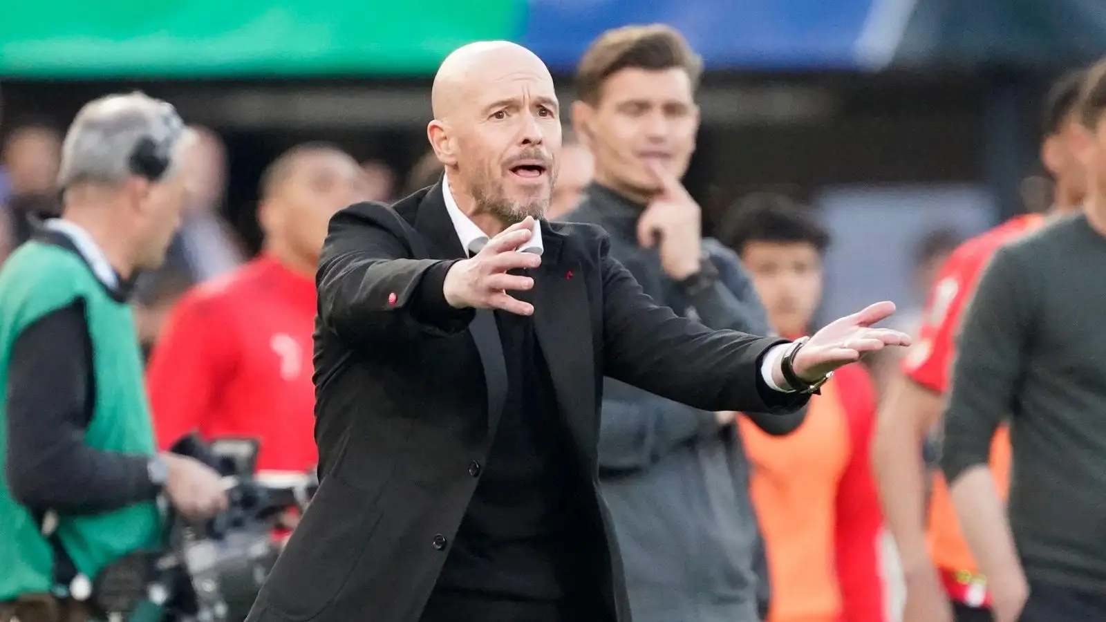 Man Utd-linked Erik ten Hag shouts and points instructions to his players
