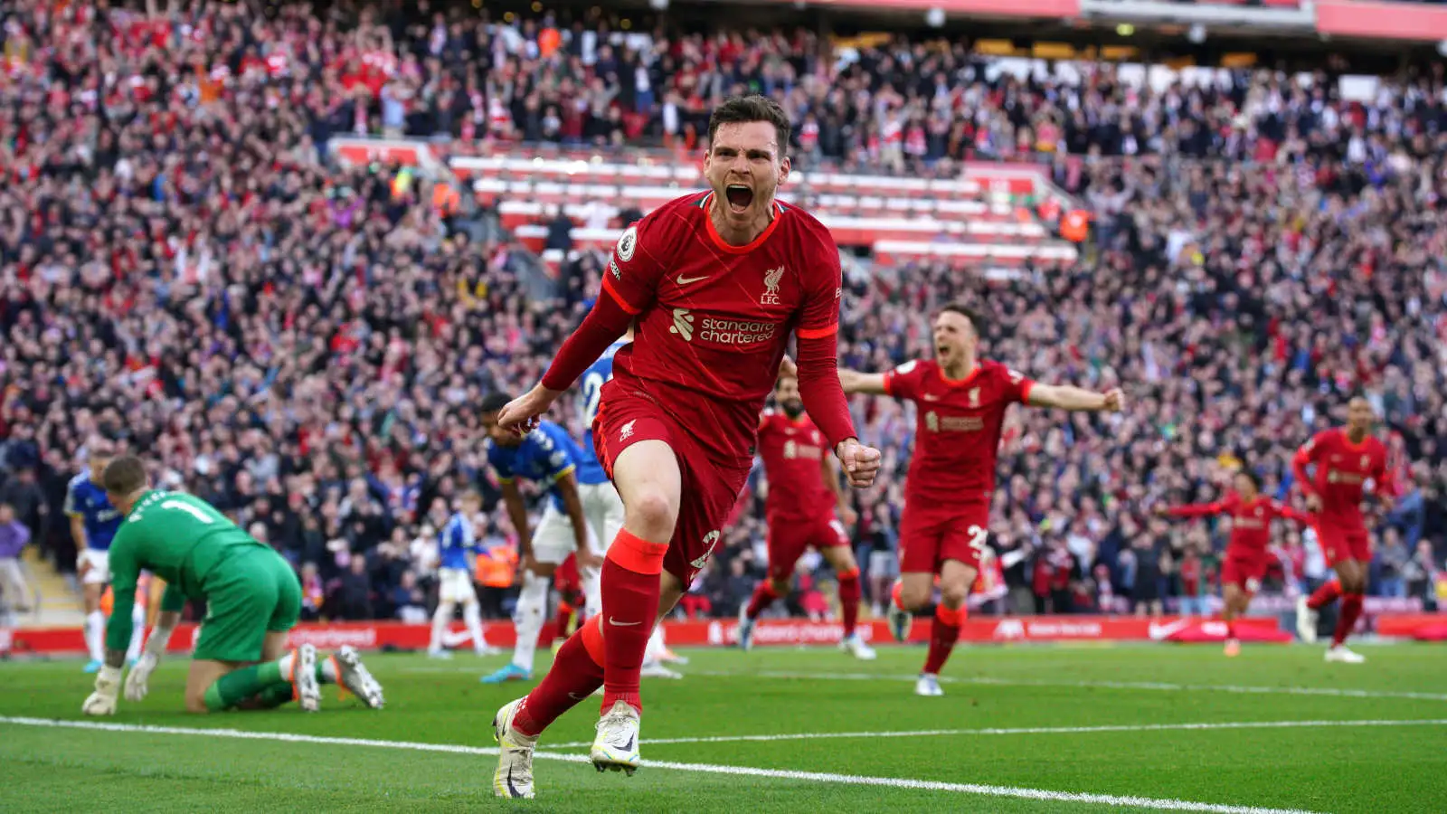 Andy Robertson celebrates scorin for Liverpool against Everton