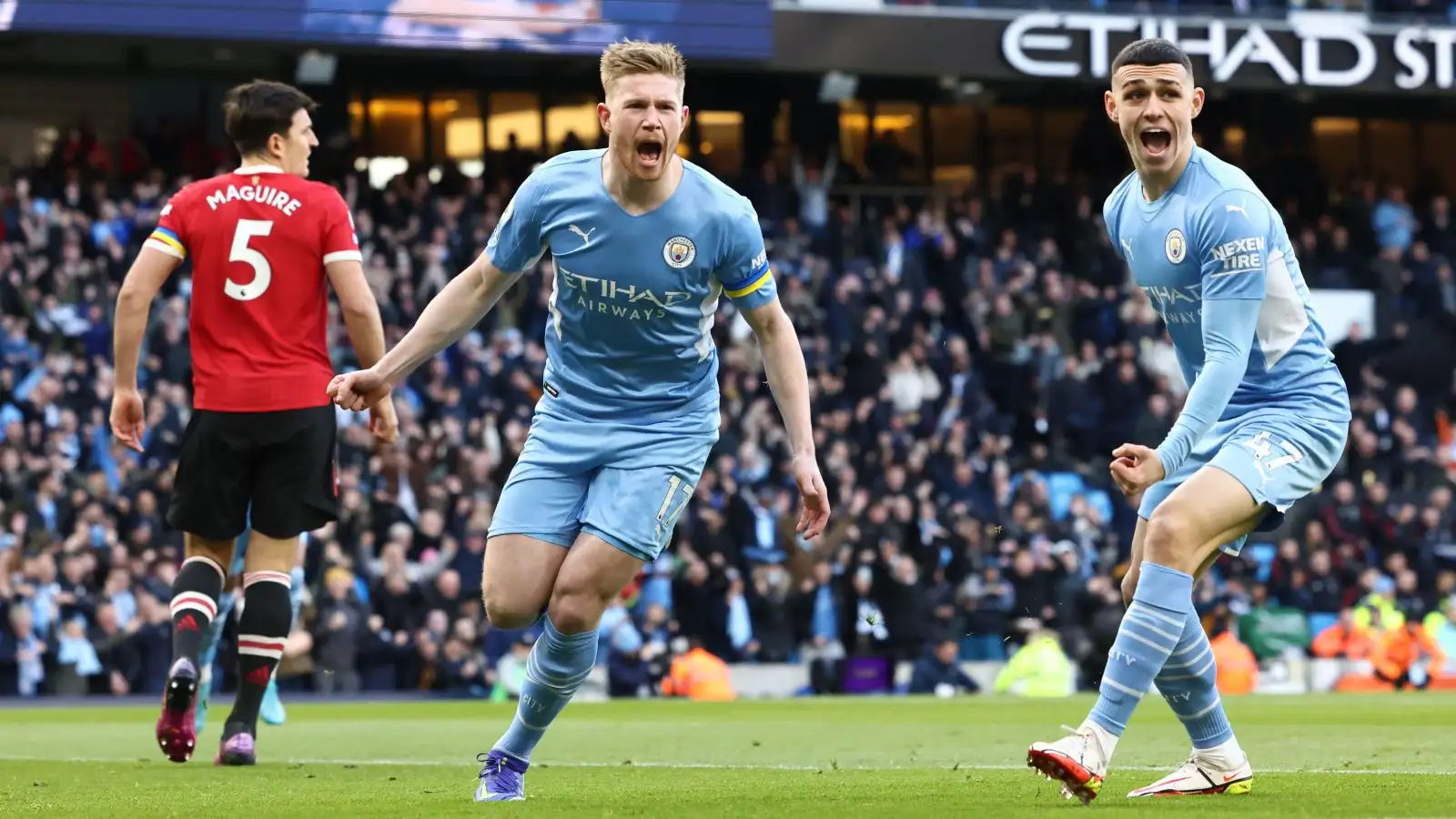 Manchester City ease to victory to keep Liverpool at bay in title race