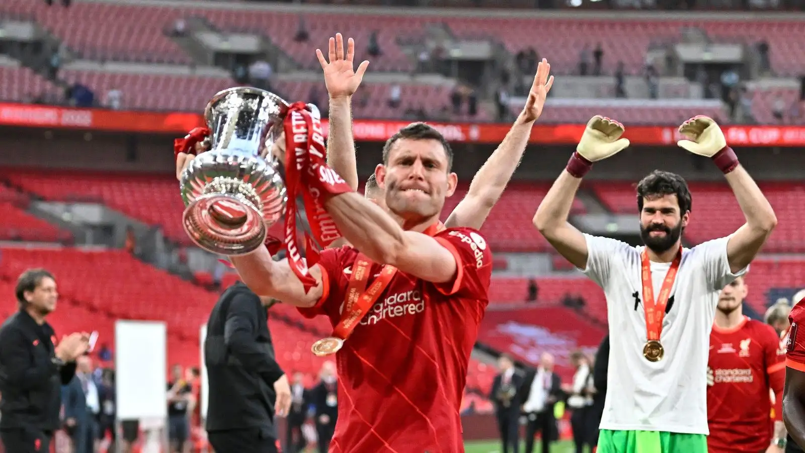 Liverpool midfielder James Milner lifts the FA Cup