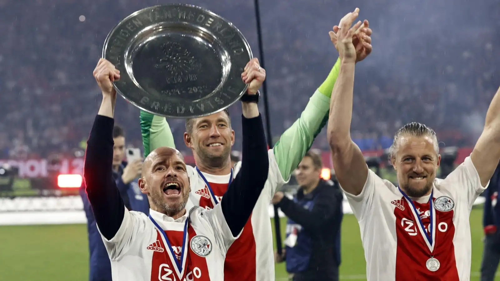 Man Utd boss Erik ten Hag lifts the Eredivisie trophy in the air