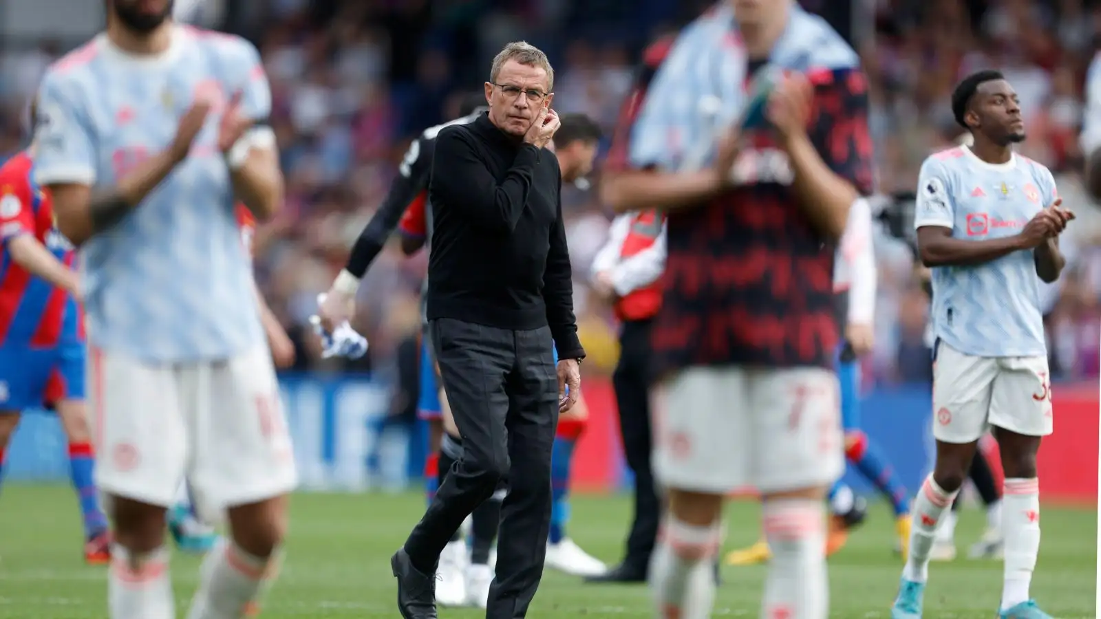 Man Utd boss Ralf Rangnick goes over to clap the fans