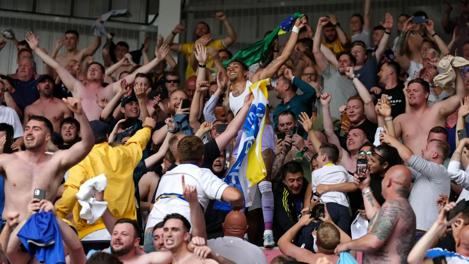 Leeds winger Raphinha celebrates with fans