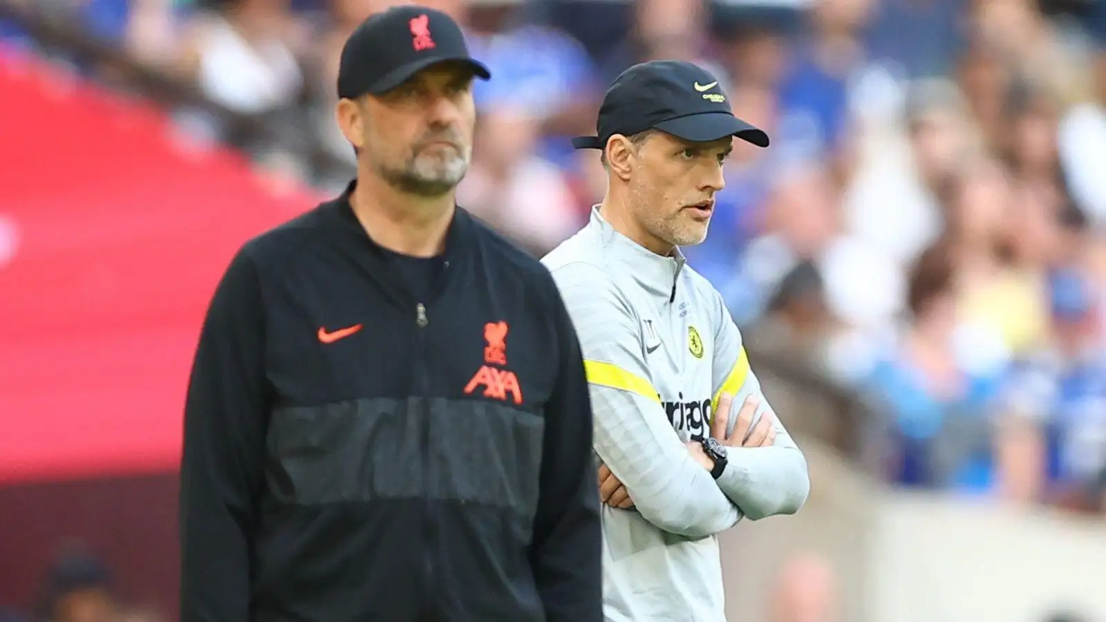 Jurgen Klopp and Thomas Tuchel watch the FA Cup final between Chelsea and Liverpool.