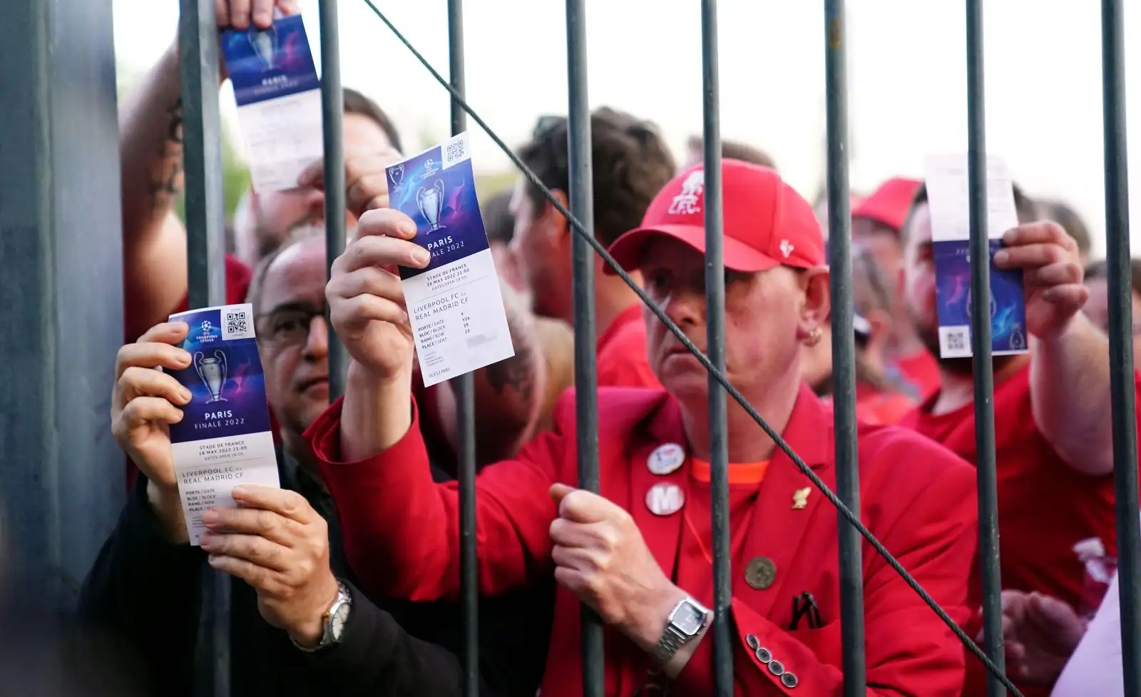 Liverpool supporters show tickets