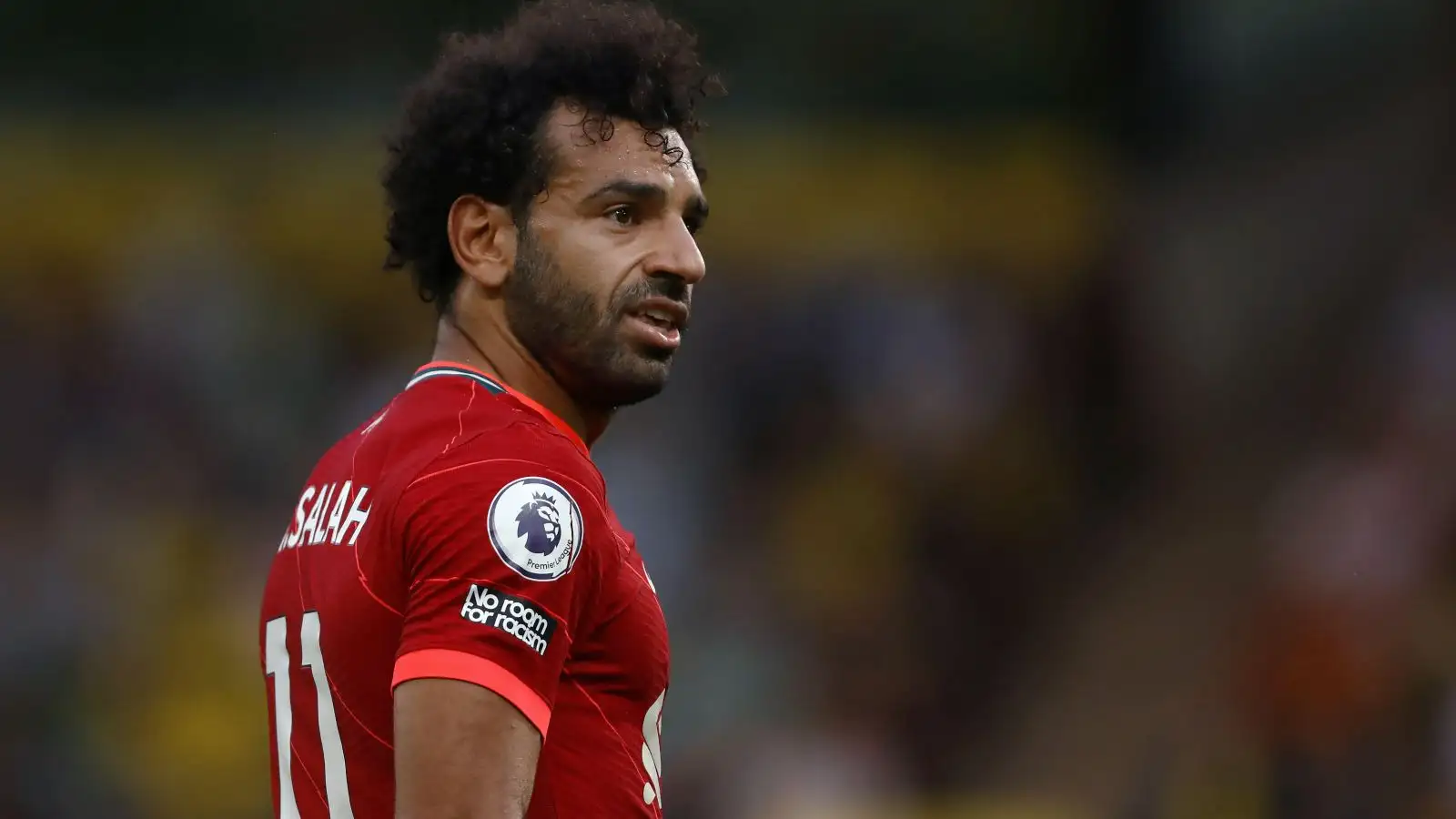 Liverpool striker Mo Salah watches play