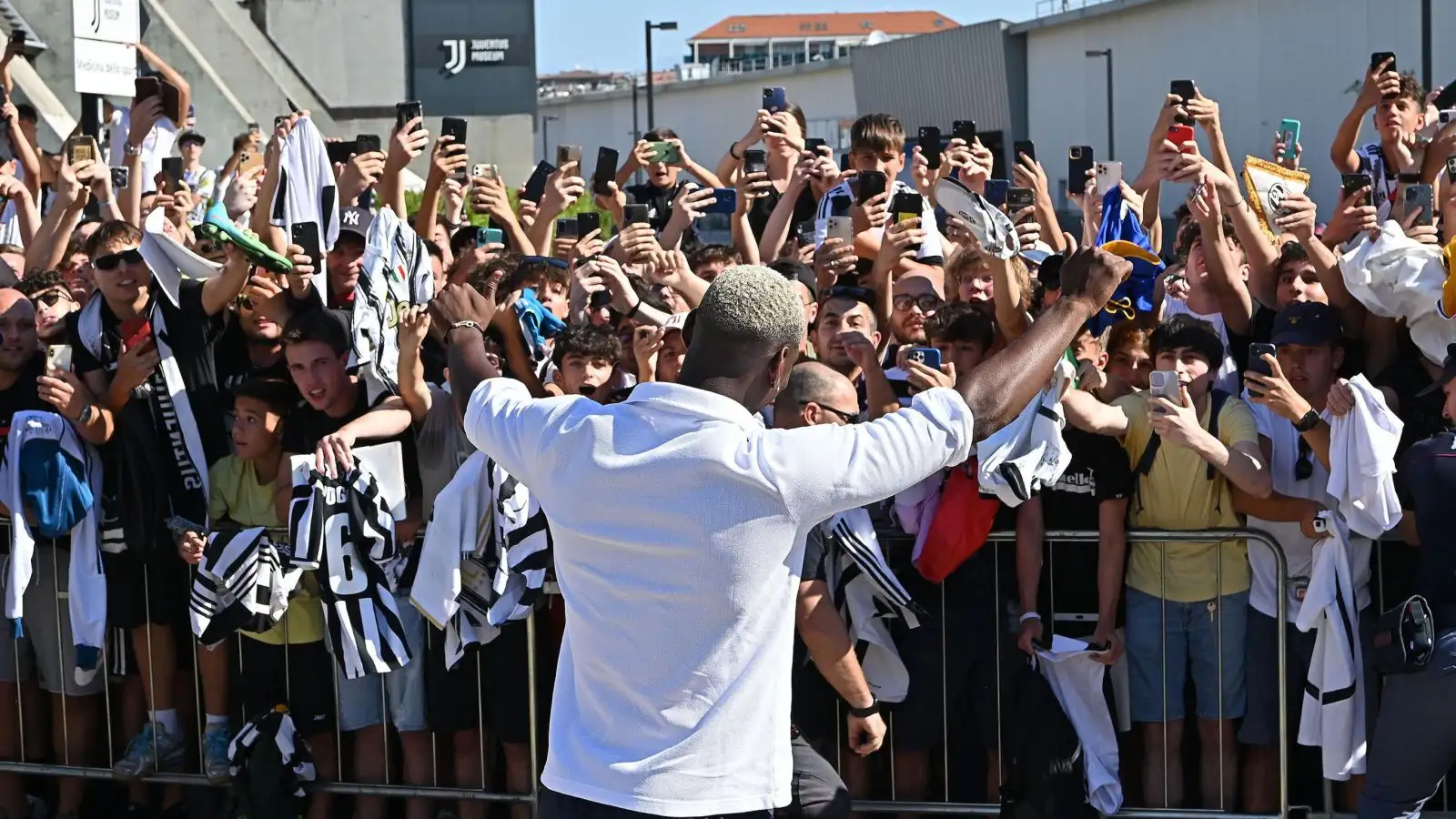 Paul Pogba waves to fans