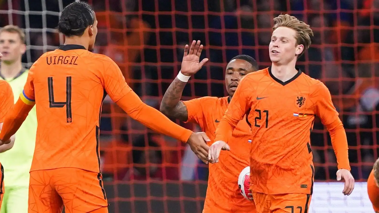 Vrigil van Dijk and Frenkie De Jong celebrate a Holland goal.