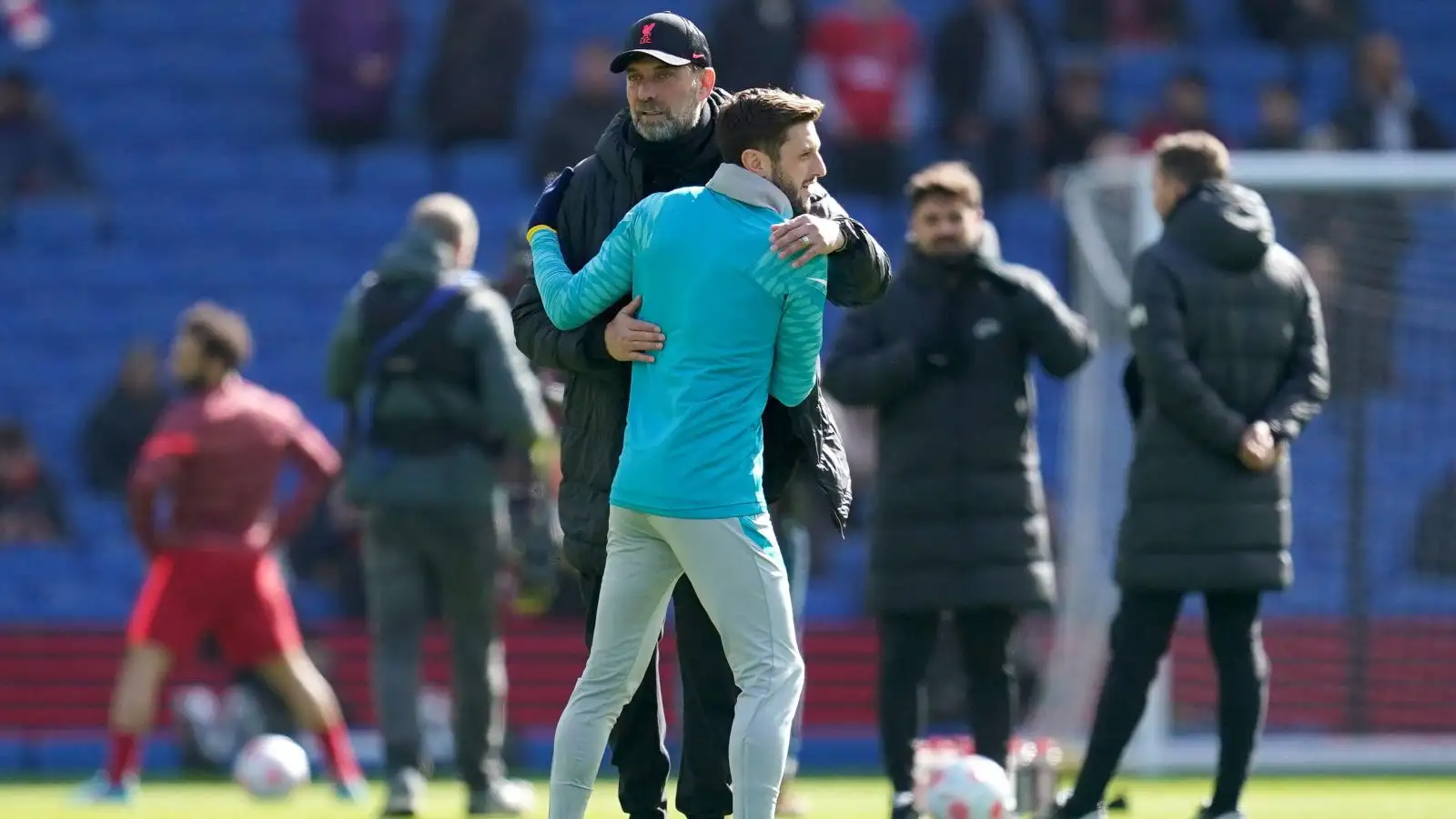 Liverpool boss Jurgen Klopp and Adam Lallana give each other a hug