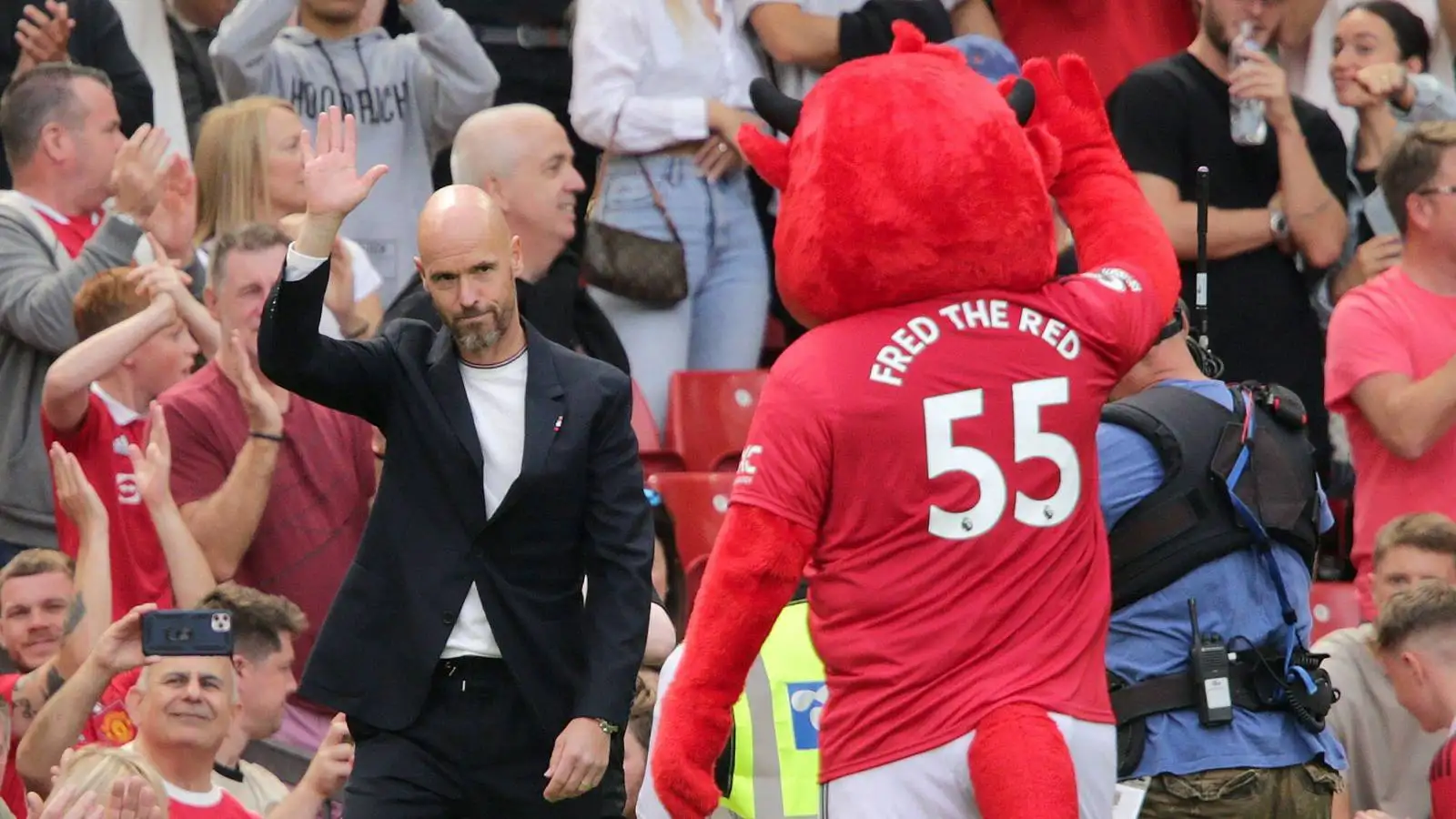 New Manchester United manager Erik ten Hag waves to fans ahead of the opening Premier League game against Brighton at Old Trafford