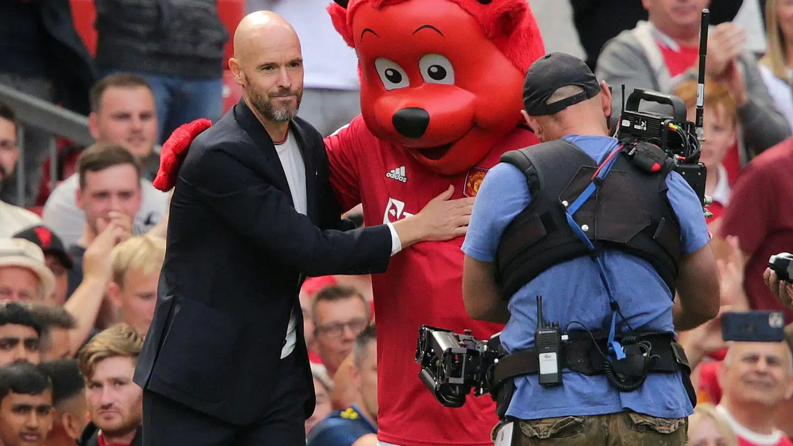 Erik ten Hag is greeted by Fred the Red before Man Utd face Brighton.