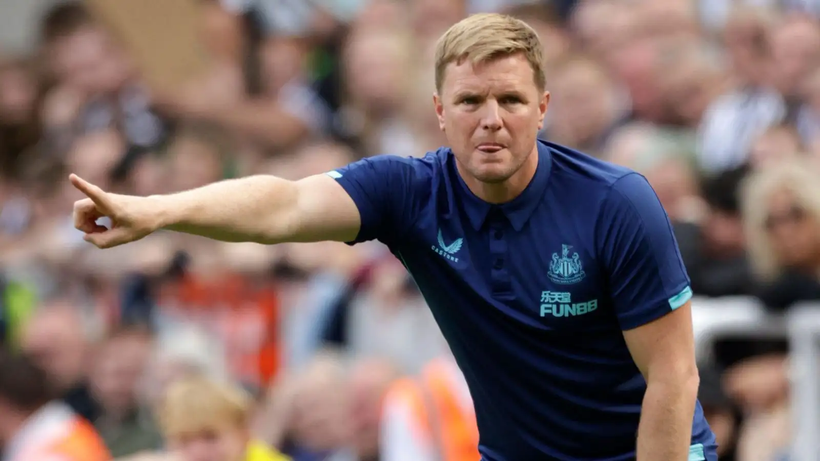 Newcastle boss Eddie Howe points instructions to his team
