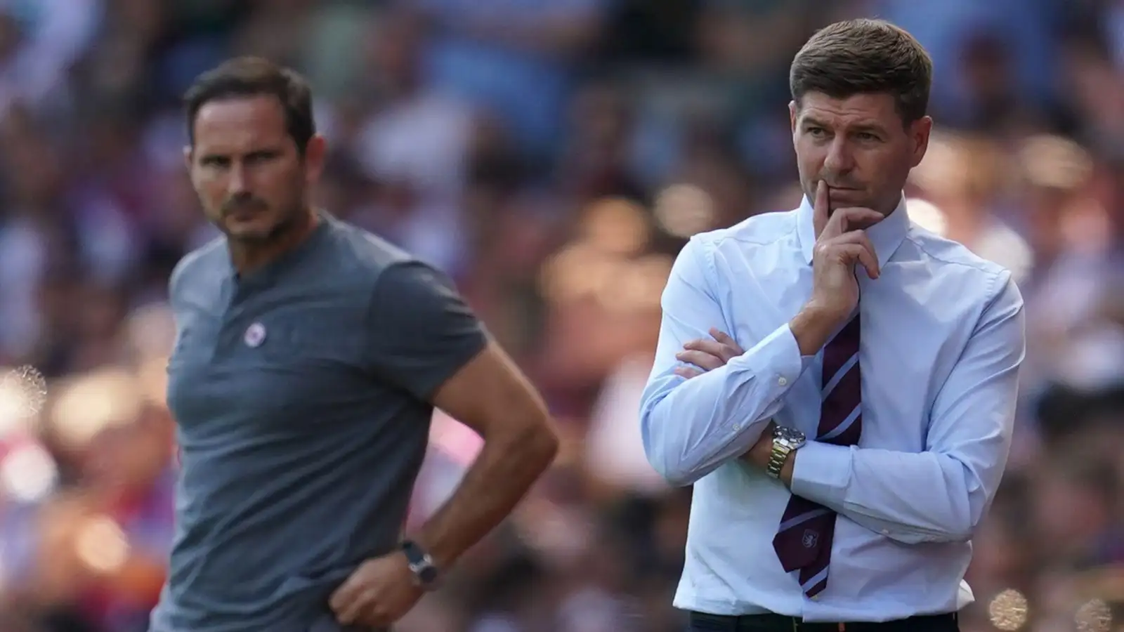 Steven Gerrard and Frank Lampard watches from the touchline