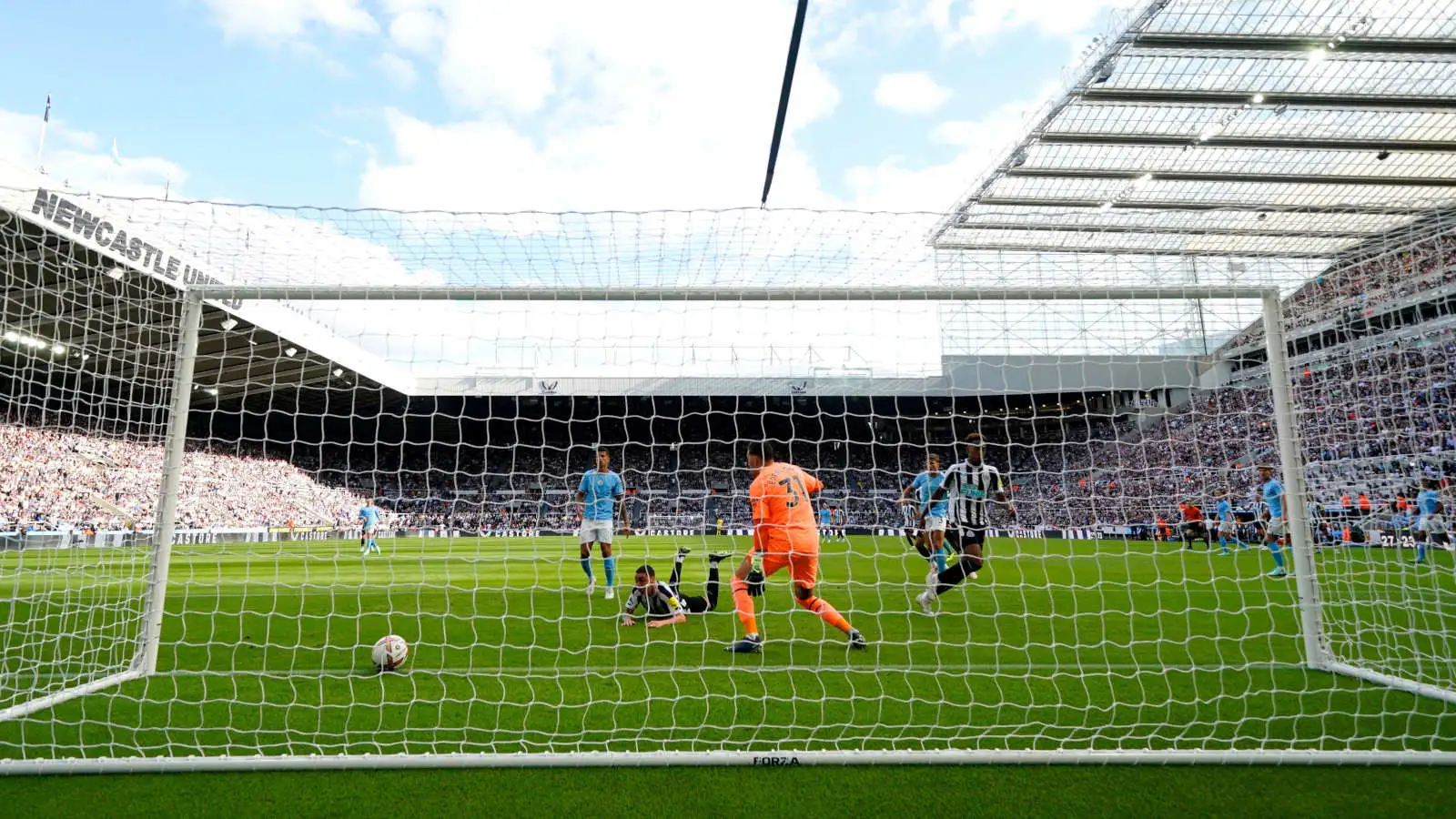 Miguel Almiron scores for Newcastle against Manchester City