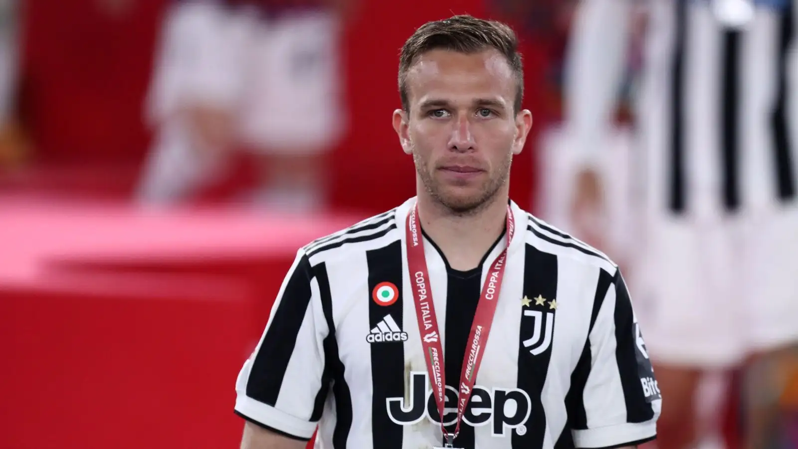 Liverpool target Arthur with his medal