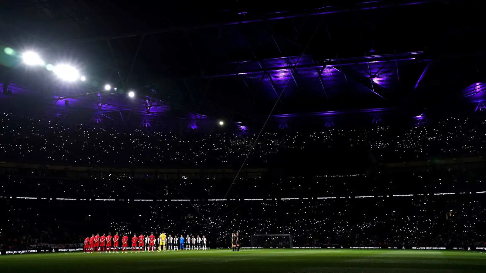 England and Germany teams observe a mnute's silence before their match at Wembley