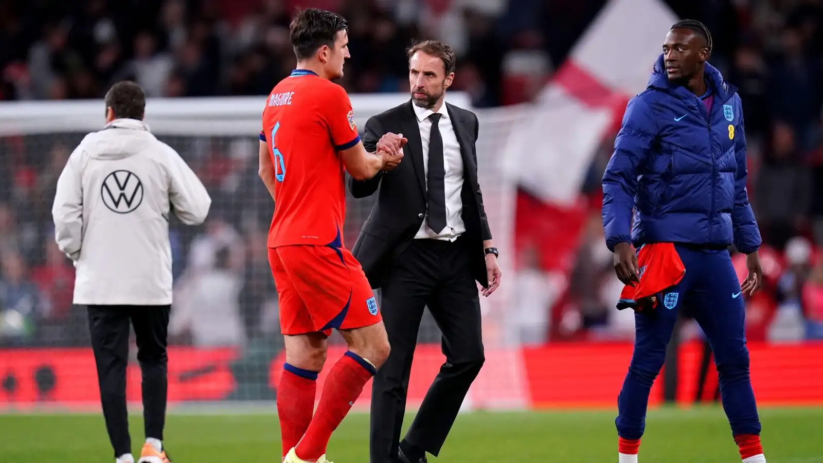 Harry Maguire shakes hands with Gareth Southgate