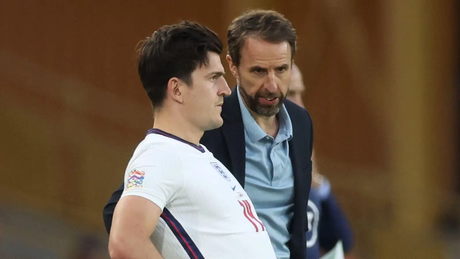 Gareth Southgate talks to Harry Maguire