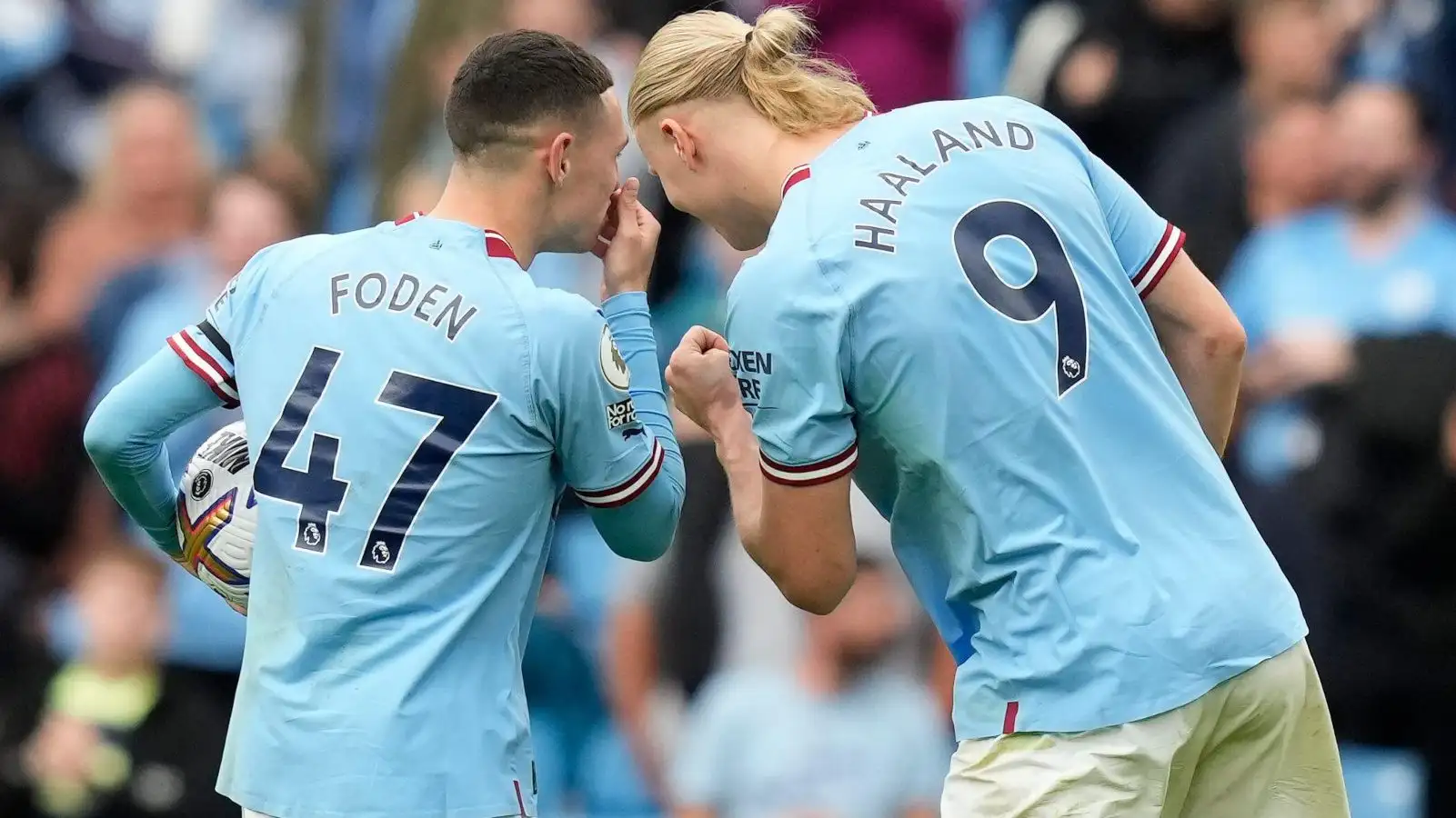 Manchester City stars Phil Foden and Erling Haaland chat after scoring hat-tricks against Manchester United.