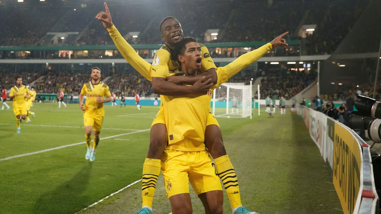 Borussia Dortmund pair Jude Bellingham and Youssoufa Moukoko celebrate a goal